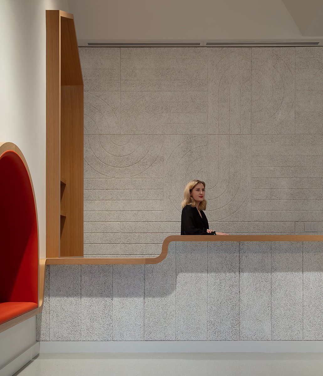Goethe-Institute san Francisco modern reception with curved wood and textured walls